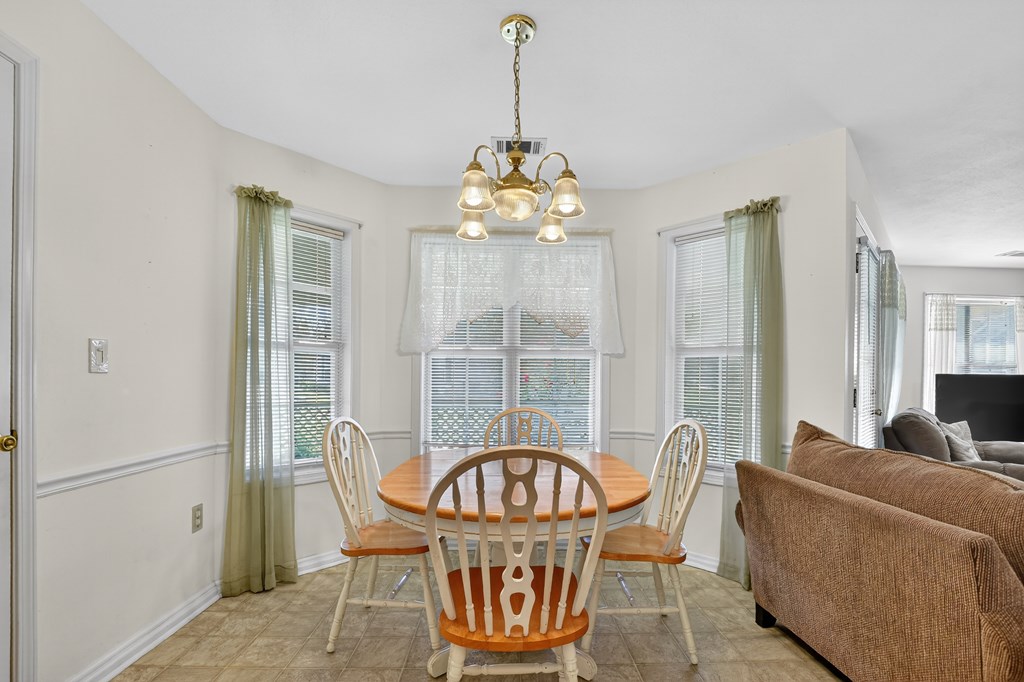 12 Sunset Court Blue Ridge, GA 30513 - Photo 8 of 23 a view of a dining room with furniture window and outside view