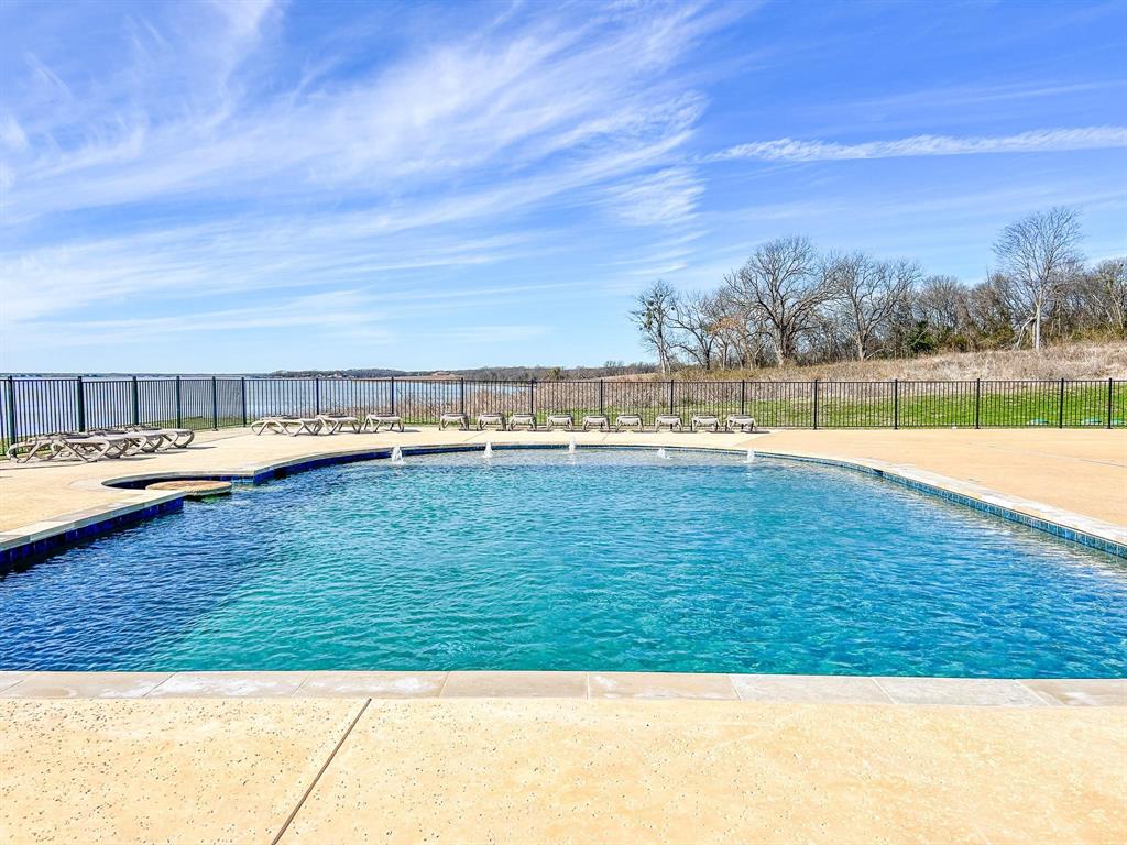 48 Chambers Bay Kerens, TX 75144 - Photo 19 of 20 a view of a swimming pool with an outdoor seating