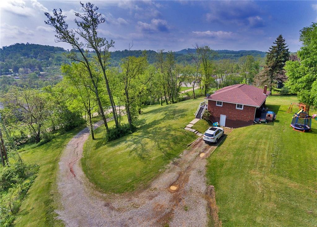 1599 Ridge Road Rostraver Township, PA 15012 - Photo 2 of 25 Gravel driveway provides access to your home.