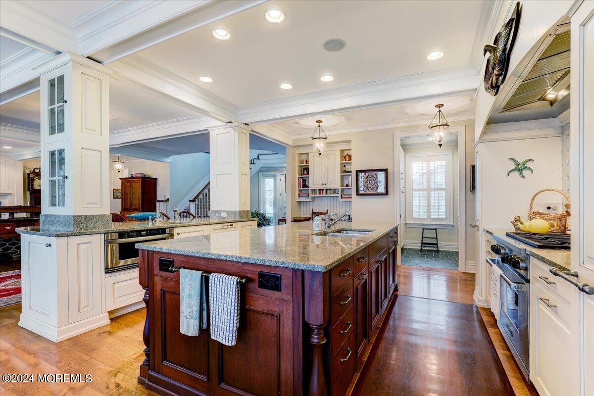 225 Channel Lane Mantoloking, NJ 08738 - Photo 13 of 85 a large kitchen with stainless steel appliances granite countertop a stove and a center island