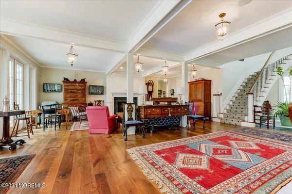 a bathroom with a granite countertop sink mirror and bathtub