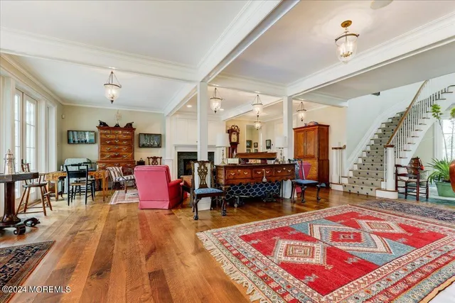a bathroom with a granite countertop sink mirror and bathtub