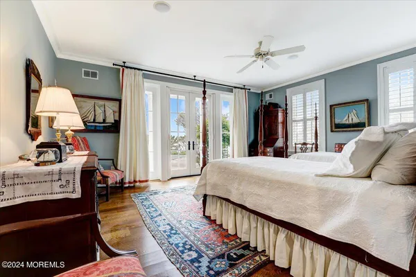 a bathroom with a toilet a sink and a mirror