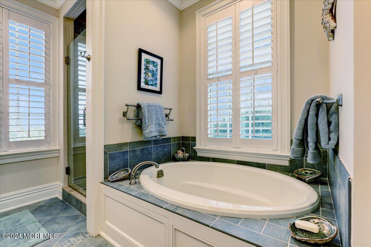 225 Channel Lane Mantoloking, NJ 08738 - Photo 34 of 85 a bathroom with a sink and a window