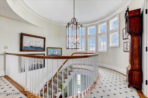 a bathroom with a shower and a glass door