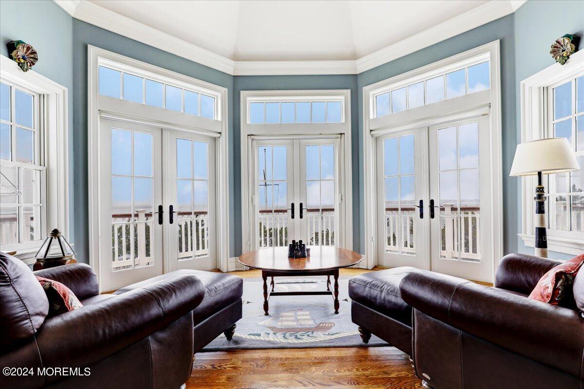 225 Channel Lane Mantoloking, NJ 08738 - Photo 39 of 85 a living room with furniture and a large window
