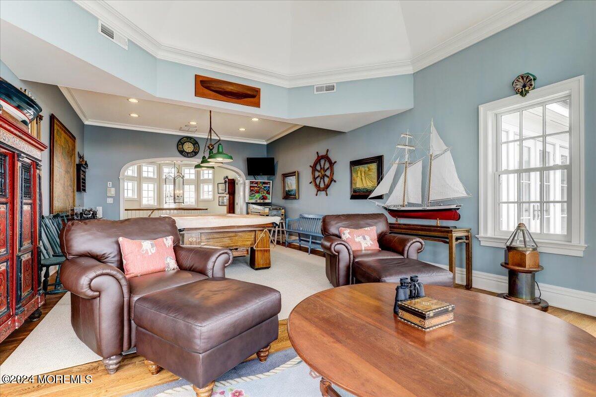 225 Channel Lane Mantoloking, NJ 08738 - Photo 40 of 85 a living room with furniture kitchen view and a wooden floor