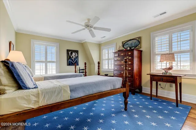 an aerial view of a house with a ocean view