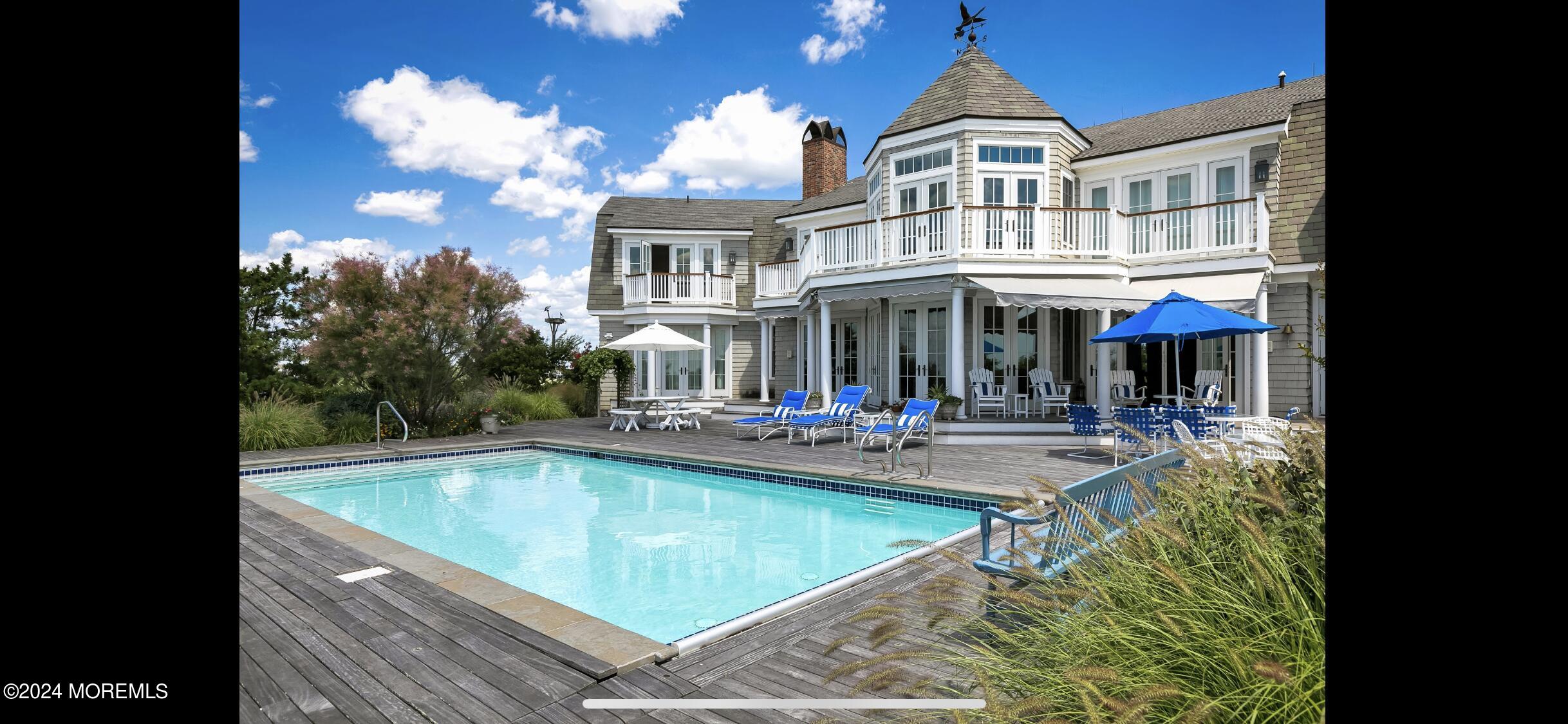 225 Channel Lane Mantoloking, NJ 08738 - Photo 85 of 85 a view of a house with swimming pool and sitting area