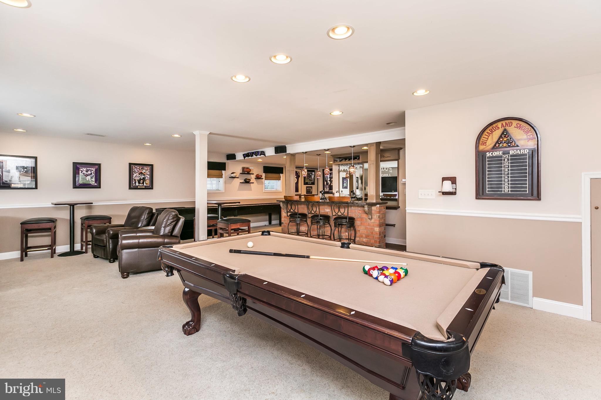 4704 White Marsh Road Baltimore, MD 21237 - Photo 42 of 60 Lower level rec room / family room with bar.