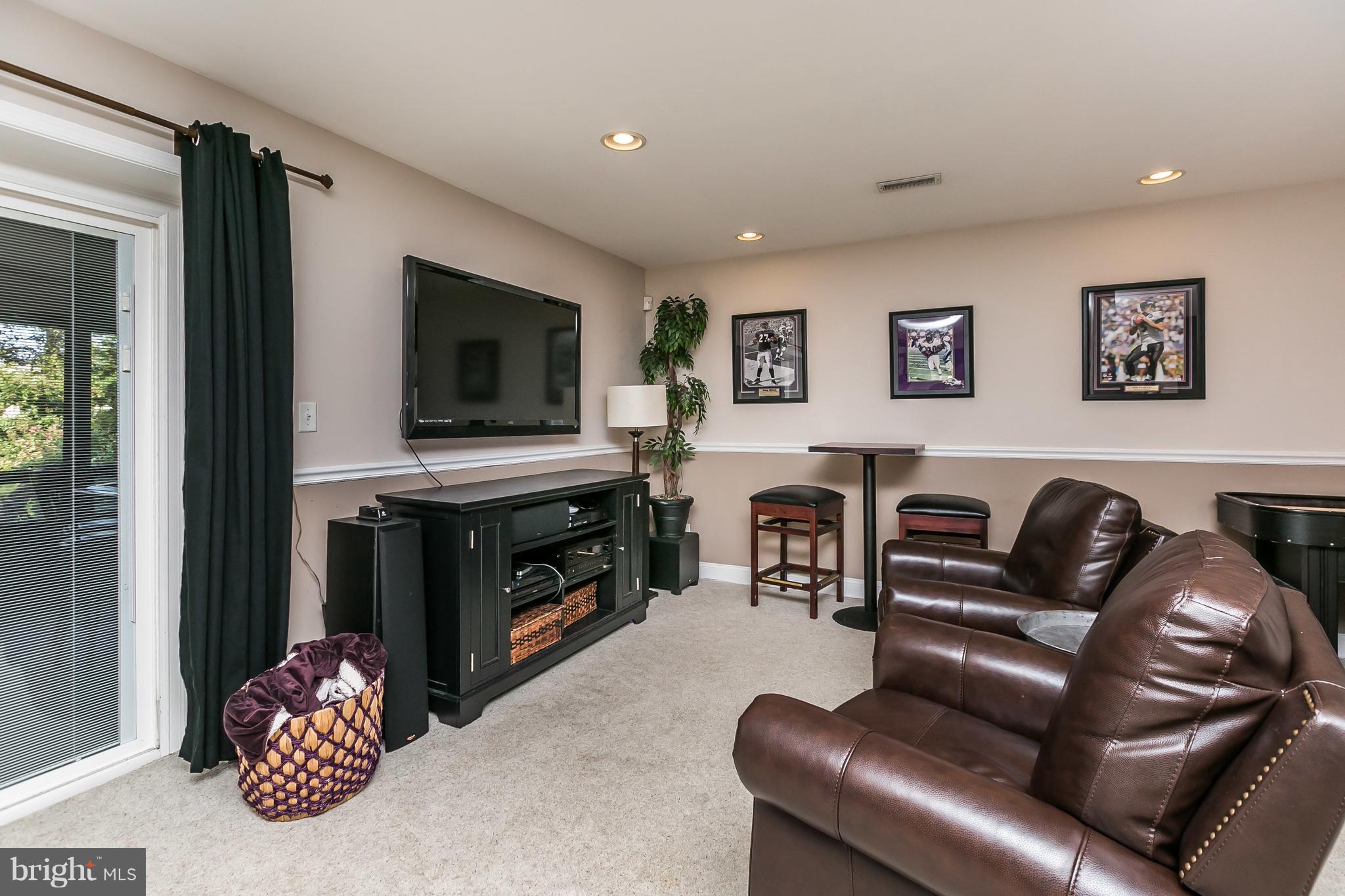 4704 White Marsh Road Baltimore, MD 21237 - Photo 44 of 60 Lower level rec room / family room with bar.