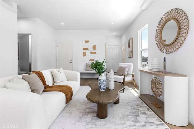 a living room with furniture and a table