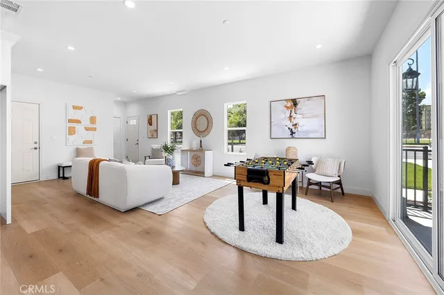 a living room with furniture and a table