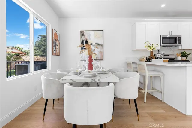 a bathroom with a sink toilet and vanity