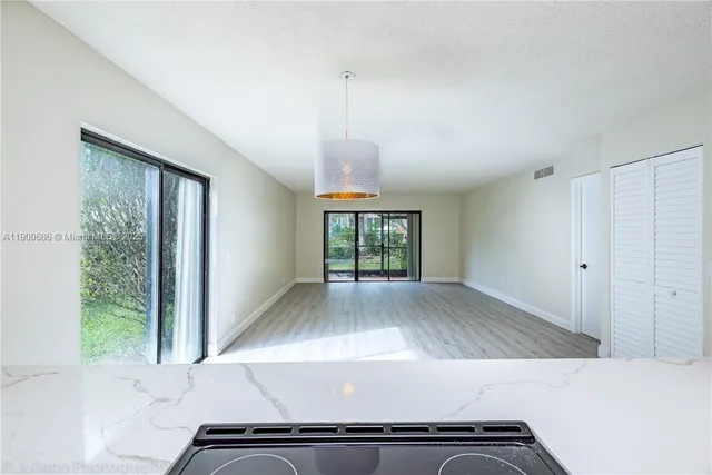 a view of an empty room and window