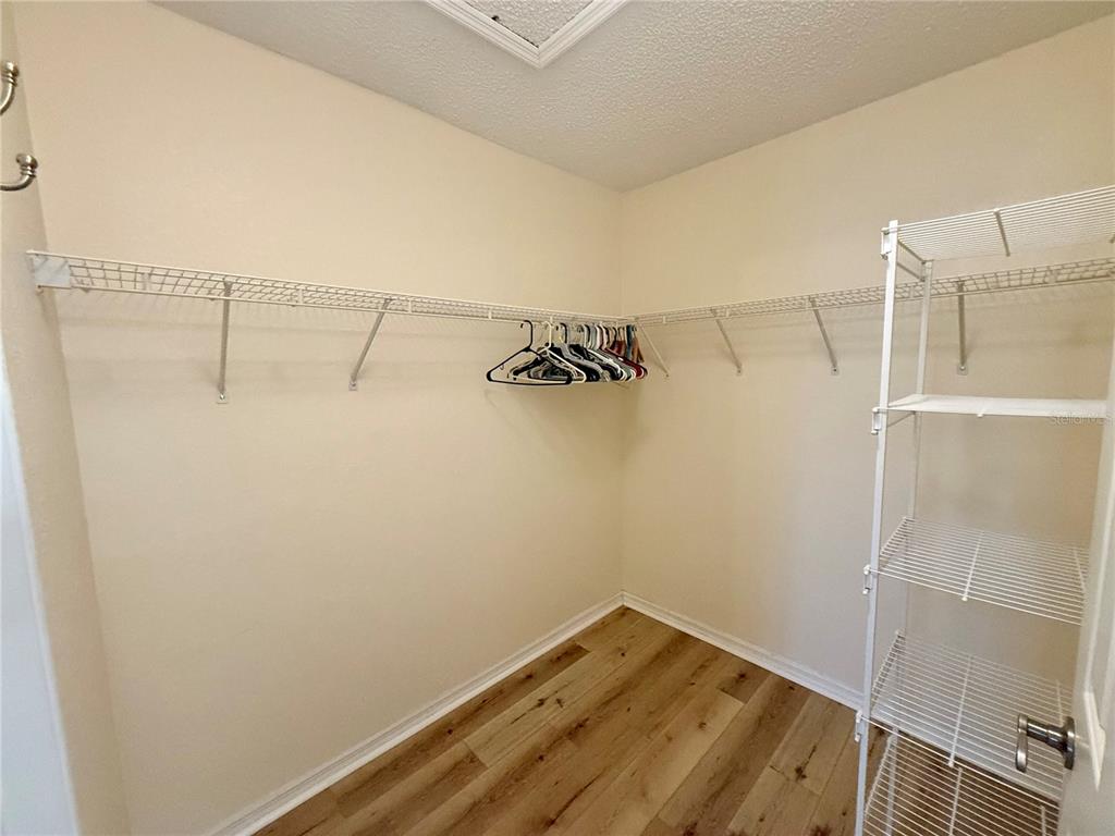8287 Southwest 116th Street Ocala, FL 34481 - Photo 29 of 40 a view of a room with racks on the wall
