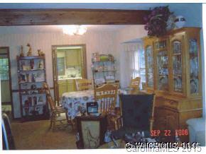 375 Riddle Cove Road Maggie Valley, NC 28751 - Photo 5 of 10 a view of dinning table and chairs in patio
