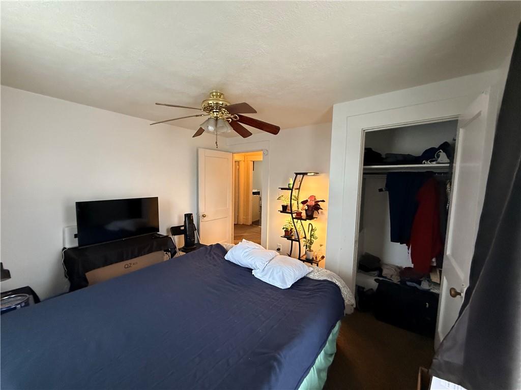 346 Mercer Street Butler, PA 16001 - Photo 18 of 19 a bedroom with a bed and a television