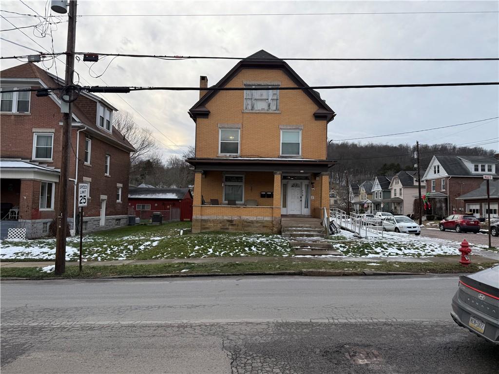 346 Mercer Street Butler, PA 16001 - Photo 2 of 19 a view of a town with large buildings and cars on road