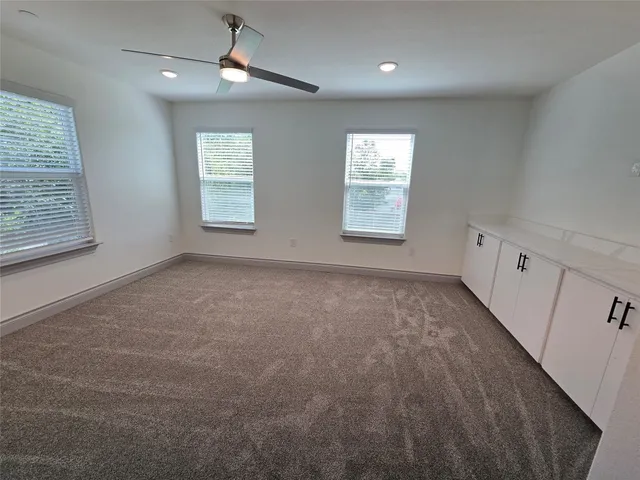 en empty room with windows