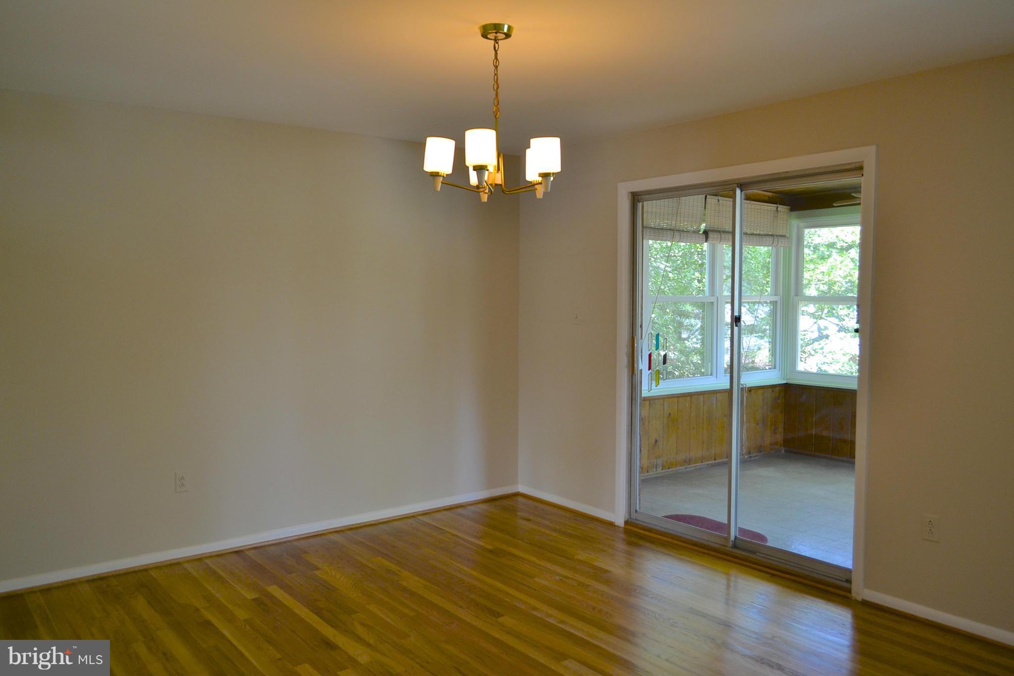 11607 Amherst Avenue Silver Spring, MD 20902 - Photo 9 of 30 Dining room leads to sun porch and deck