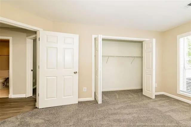 an empty room with windows