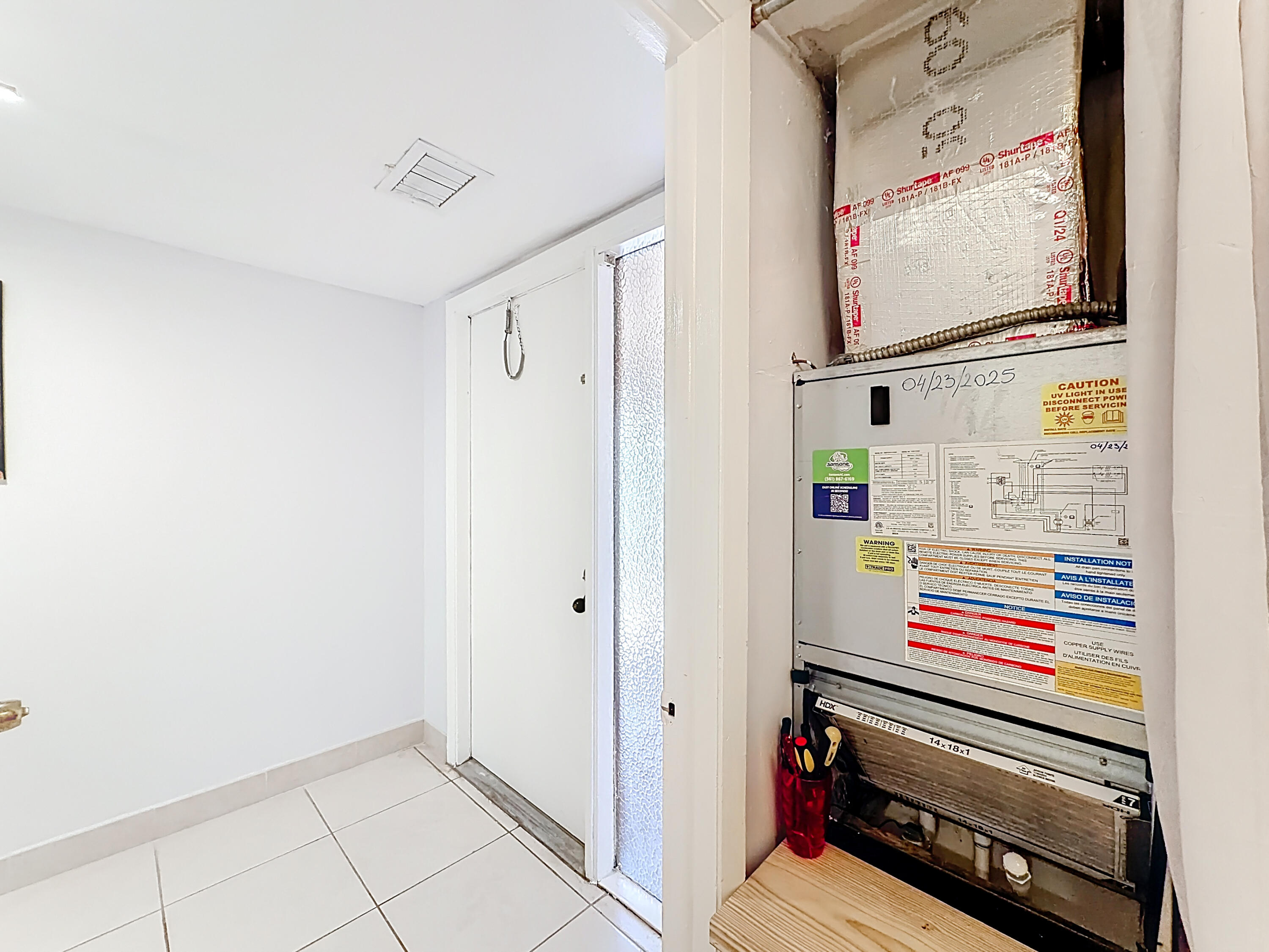 755 Dotterel Road, Unit 1411 Delray Beach, FL 33444 - Photo 30 of 51 755 Dotterel Road Laundry Room - AC