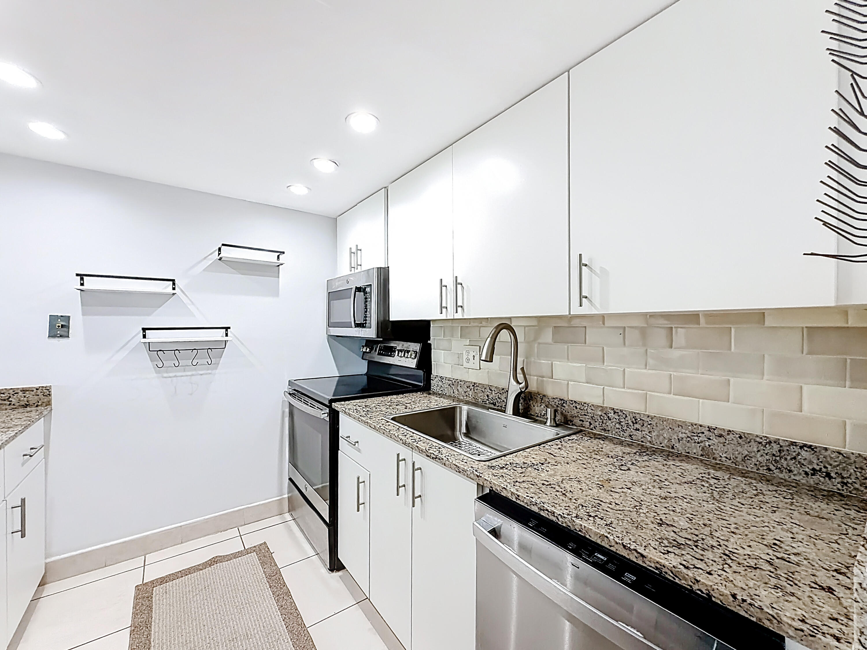 755 Dotterel Road, Unit 1411 Delray Beach, FL 33444 - Photo 7 of 51 755 Dotterel Road- Kitchen