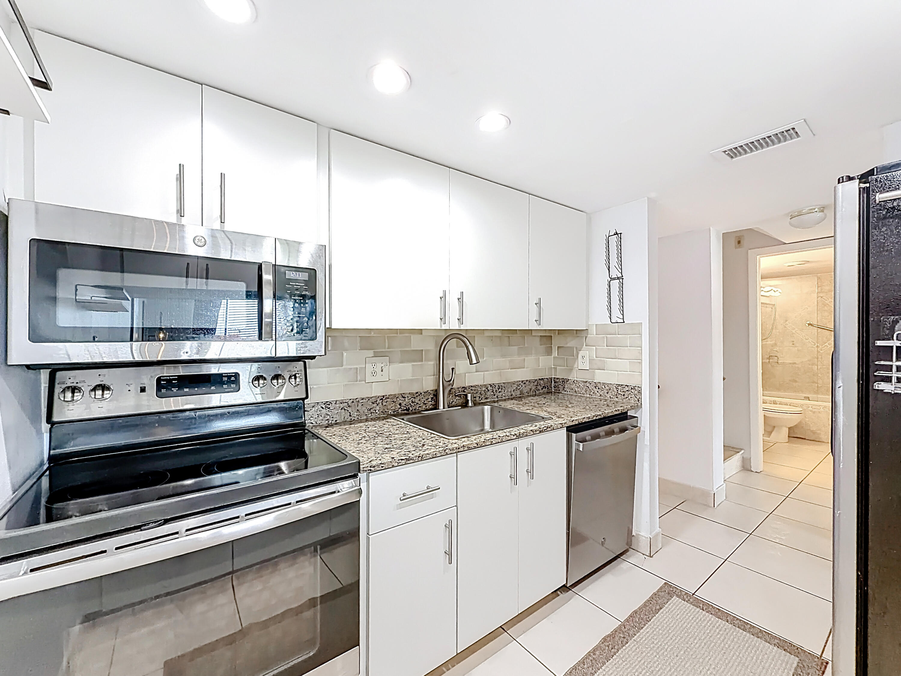 755 Dotterel Road, Unit 1411 Delray Beach, FL 33444 - Photo 8 of 51 755 Dotterel Road- Kitchen