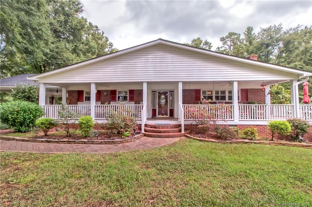 367 Potter Road Lancaster, SC 29720 - Photo 1 of 30 a front view of a house with garden