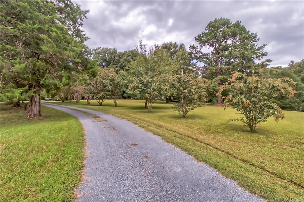 367 Potter Road Lancaster, SC 29720 - Photo 2 of 30 a view of a park with large trees