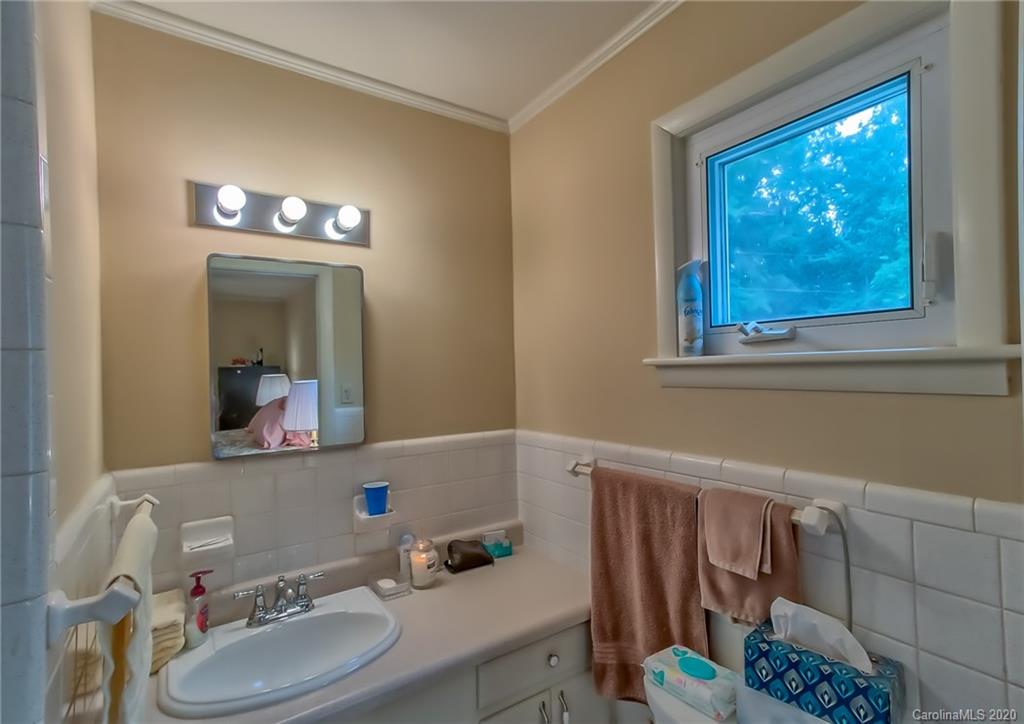 367 Potter Road Lancaster, SC 29720 - Photo 15 of 30 a bathroom with a sink mirror and toilet