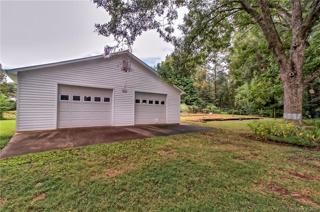 367 Potter Road Lancaster, SC 29720 - Photo 20 of 30 a view of a house with a yard