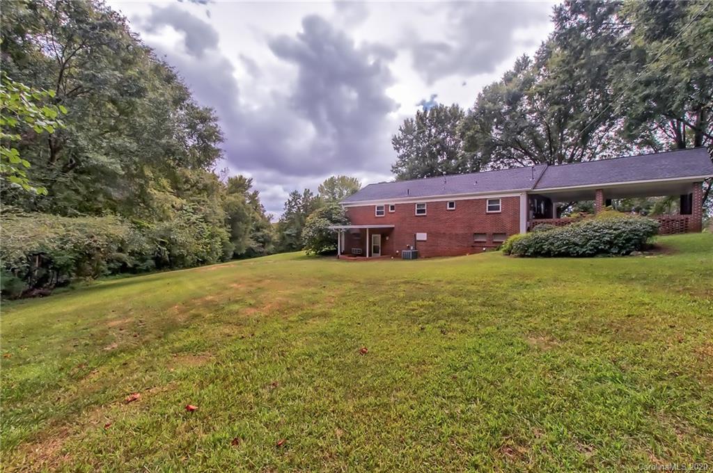 367 Potter Road Lancaster, SC 29720 - Photo 23 of 30 a view of a house with a big yard