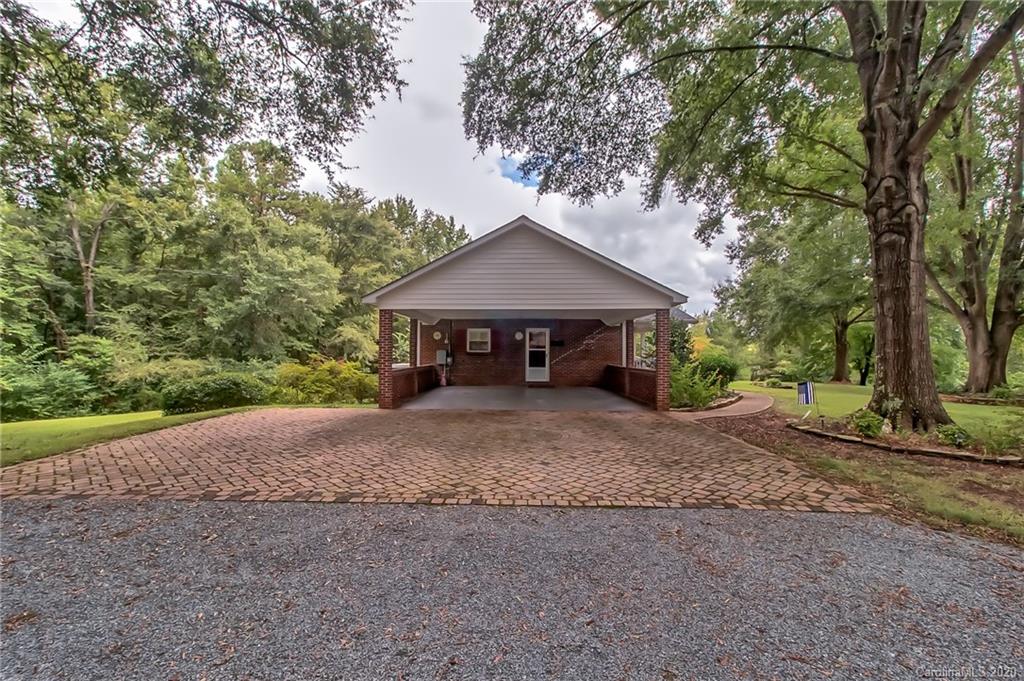 367 Potter Road Lancaster, SC 29720 - Photo 26 of 30 a front view of a house with garden