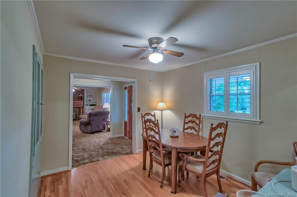 367 Potter Road Lancaster, SC 29720 - Photo 10 of 30 a view of a dining room with furniture and chandelier