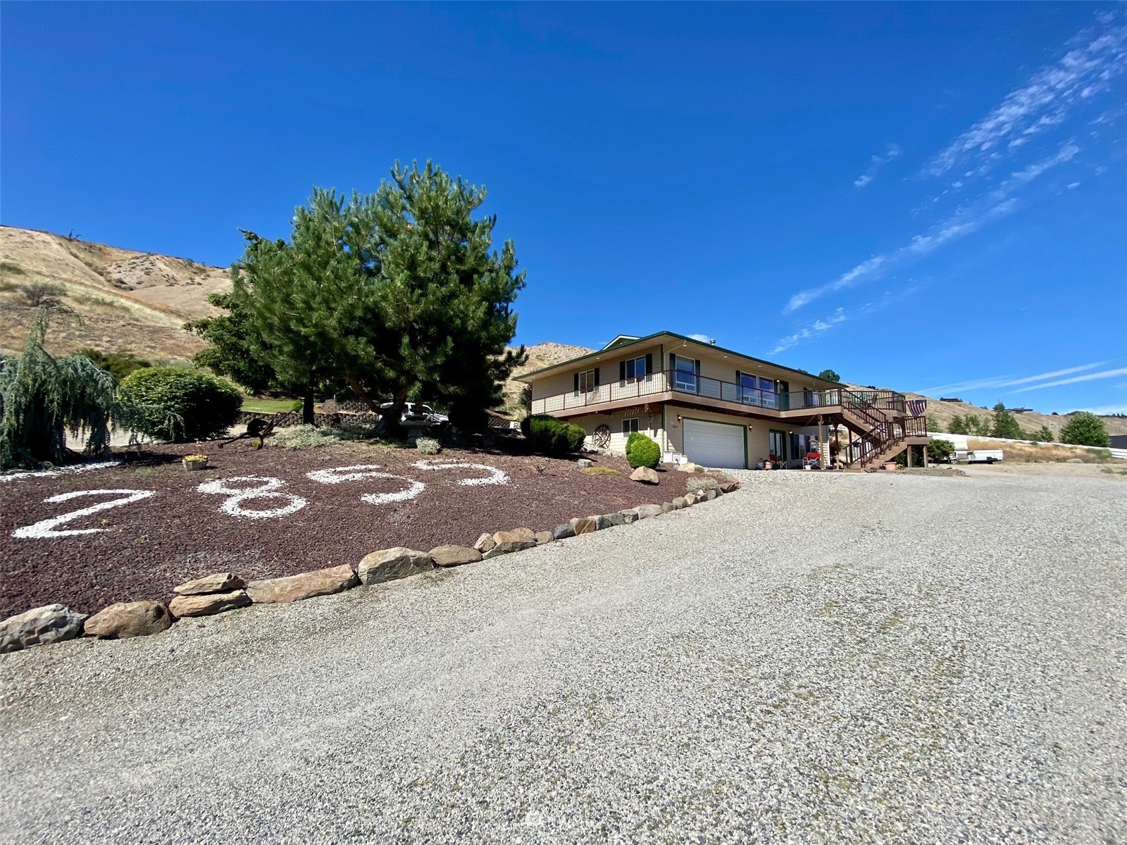 2855 Rock Island Road East Wenatchee, WA 98802 - Photo 2 of 30 a view of street with trees