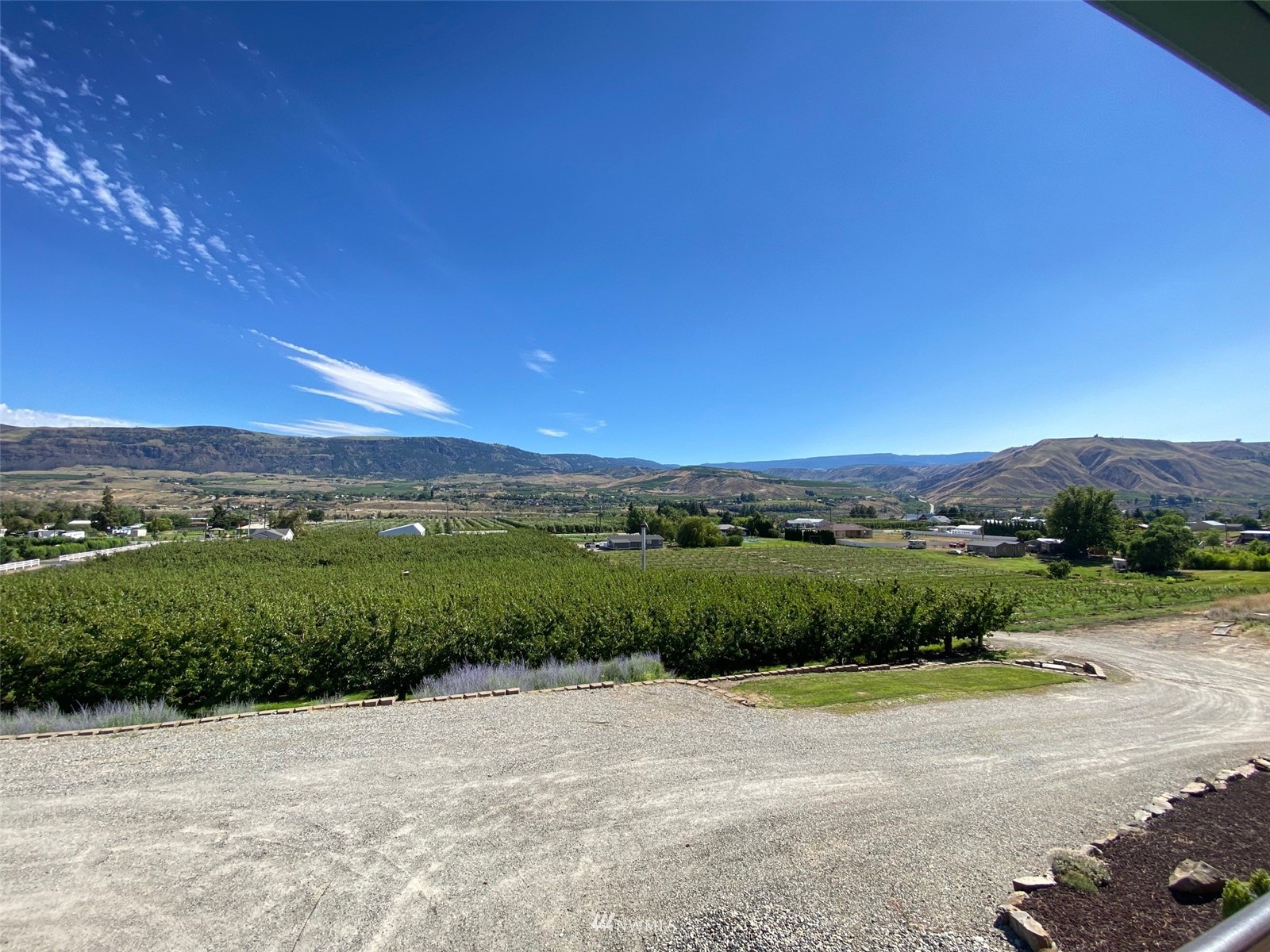 2855 Rock Island Road East Wenatchee, WA 98802 - Photo 27 of 30 a view of a road with a garden