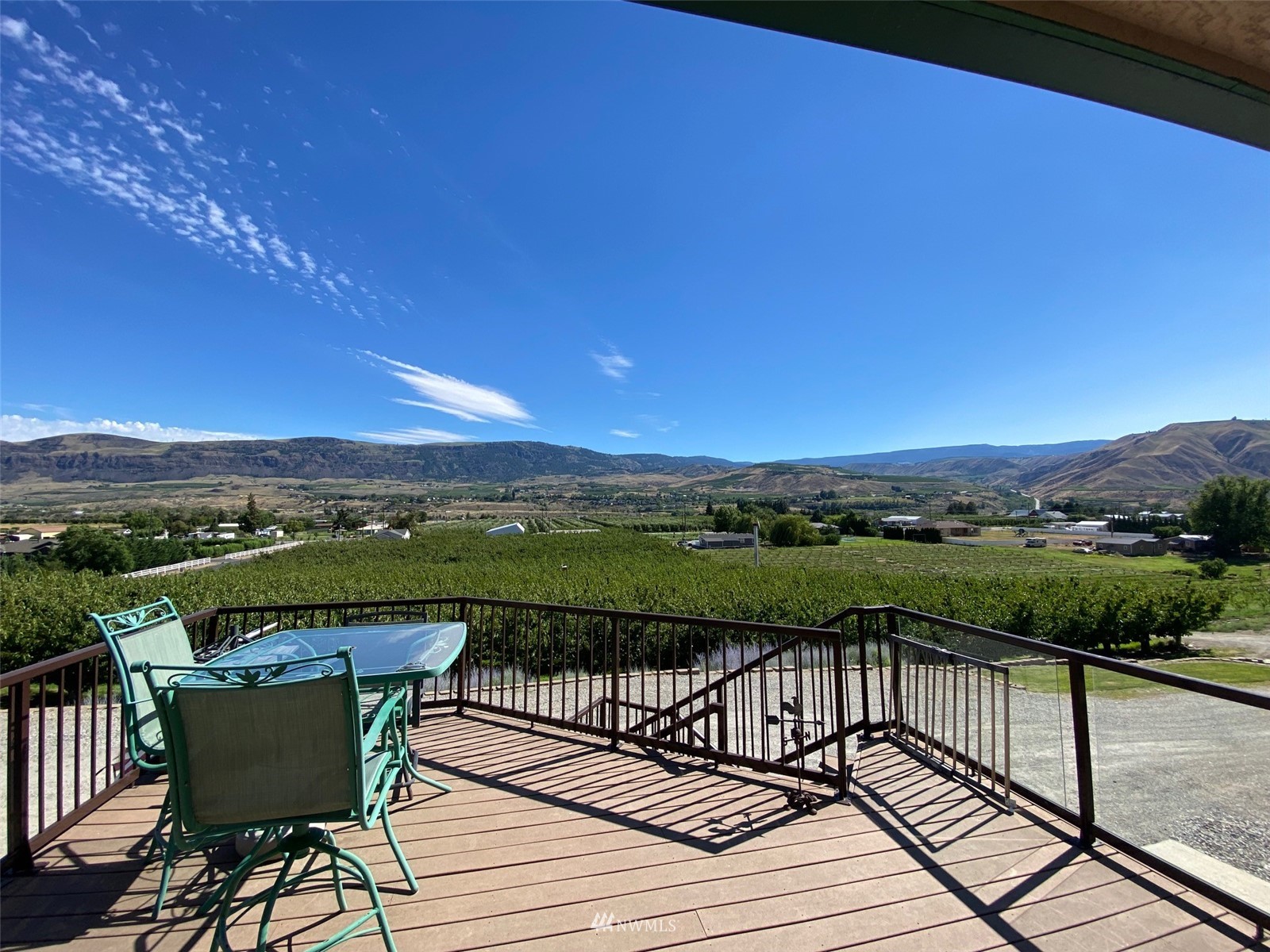 2855 Rock Island Road East Wenatchee, WA 98802 - Photo 28 of 30 a view of a balcony with wooden floor and lake view