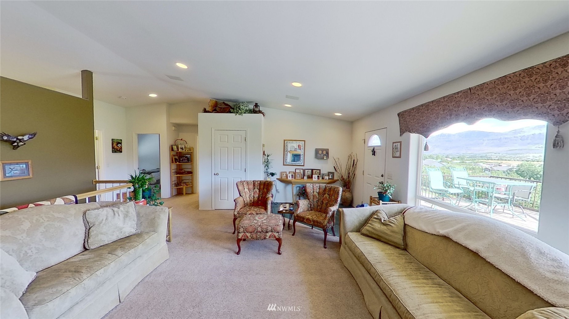 2855 Rock Island Road East Wenatchee, WA 98802 - Photo 9 of 30 a living room with furniture and a large window