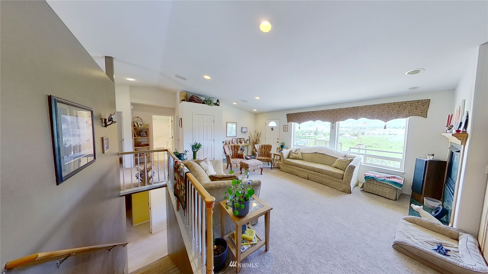 2855 Rock Island Road East Wenatchee, WA 98802 - Photo 10 of 30 a living room with furniture and a flat screen tv
