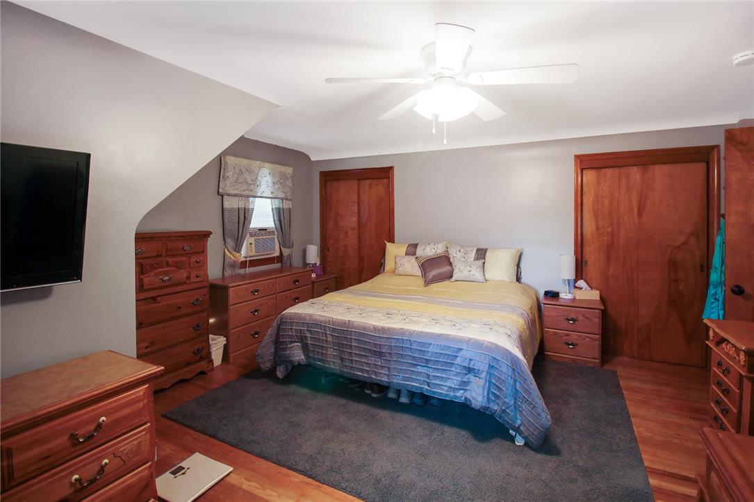 1256 Ridge Avenue Whitehall, PA 18052 - Photo 30 of 43 Comfortable sleeping quarters with rich hardwood flooring and a functional ceiling fan.