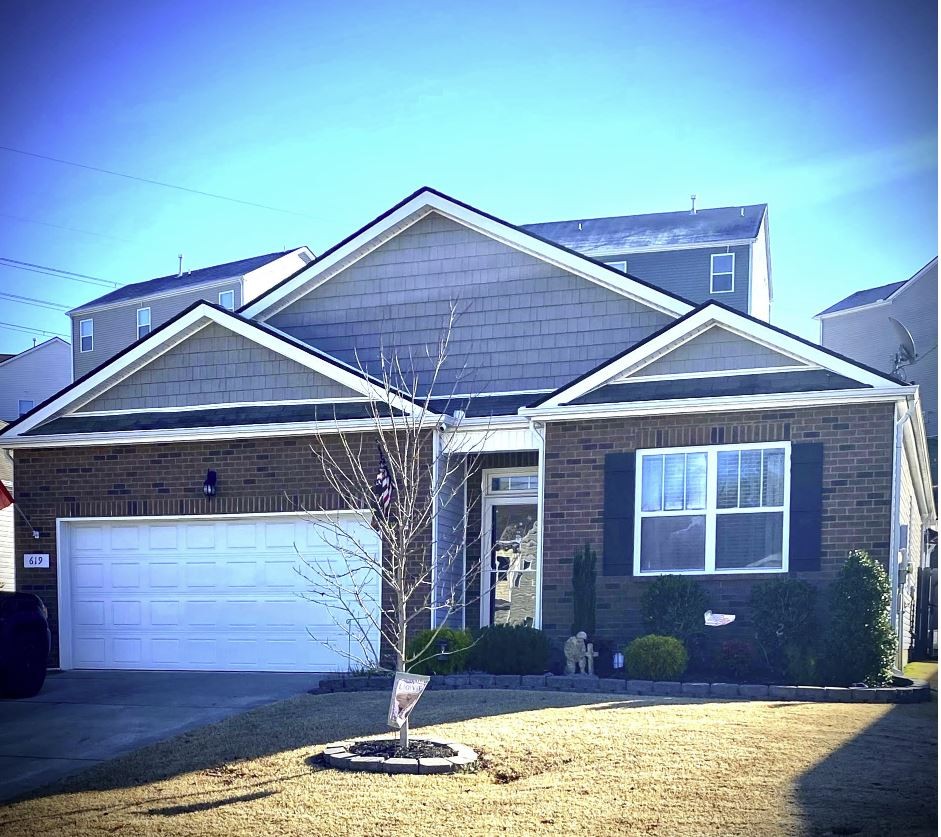 619 Prominence Road Columbia, TN 38401 - Photo 2 of 19 a front view of a house with a yard
