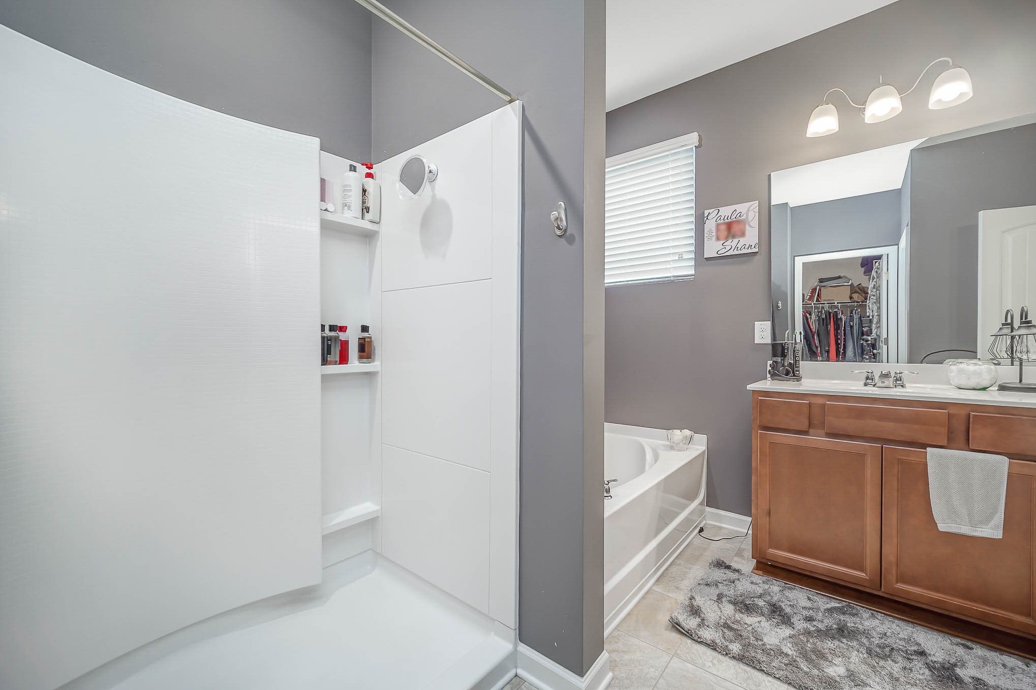 619 Prominence Road Columbia, TN 38401 - Photo 15 of 19 a bathroom with a tub sink and mirror