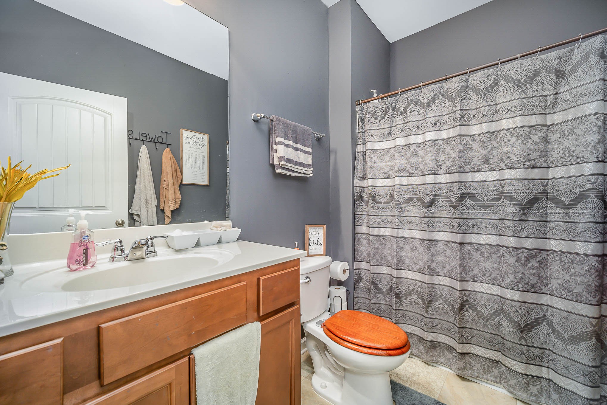 619 Prominence Road Columbia, TN 38401 - Photo 6 of 19 a bathroom with a sink a toilet and a mirror