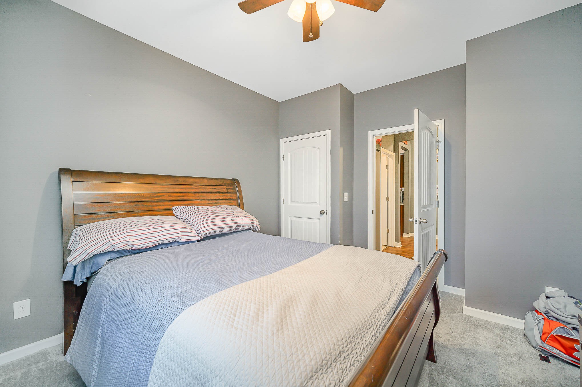 619 Prominence Road Columbia, TN 38401 - Photo 8 of 19 a bedroom with a bed and wooden floor