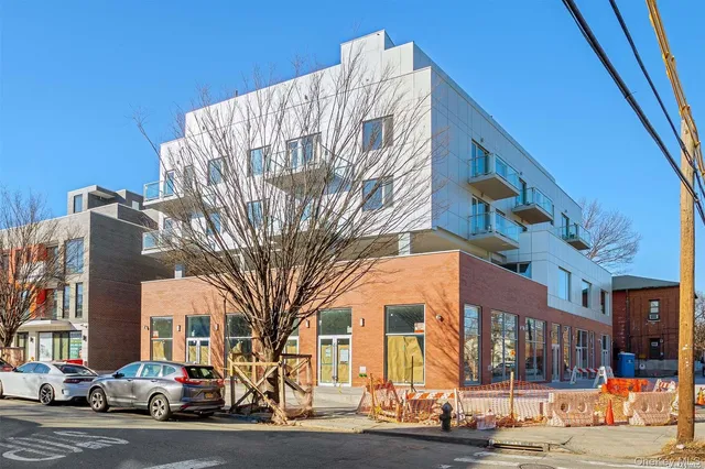 a view of a building with a street