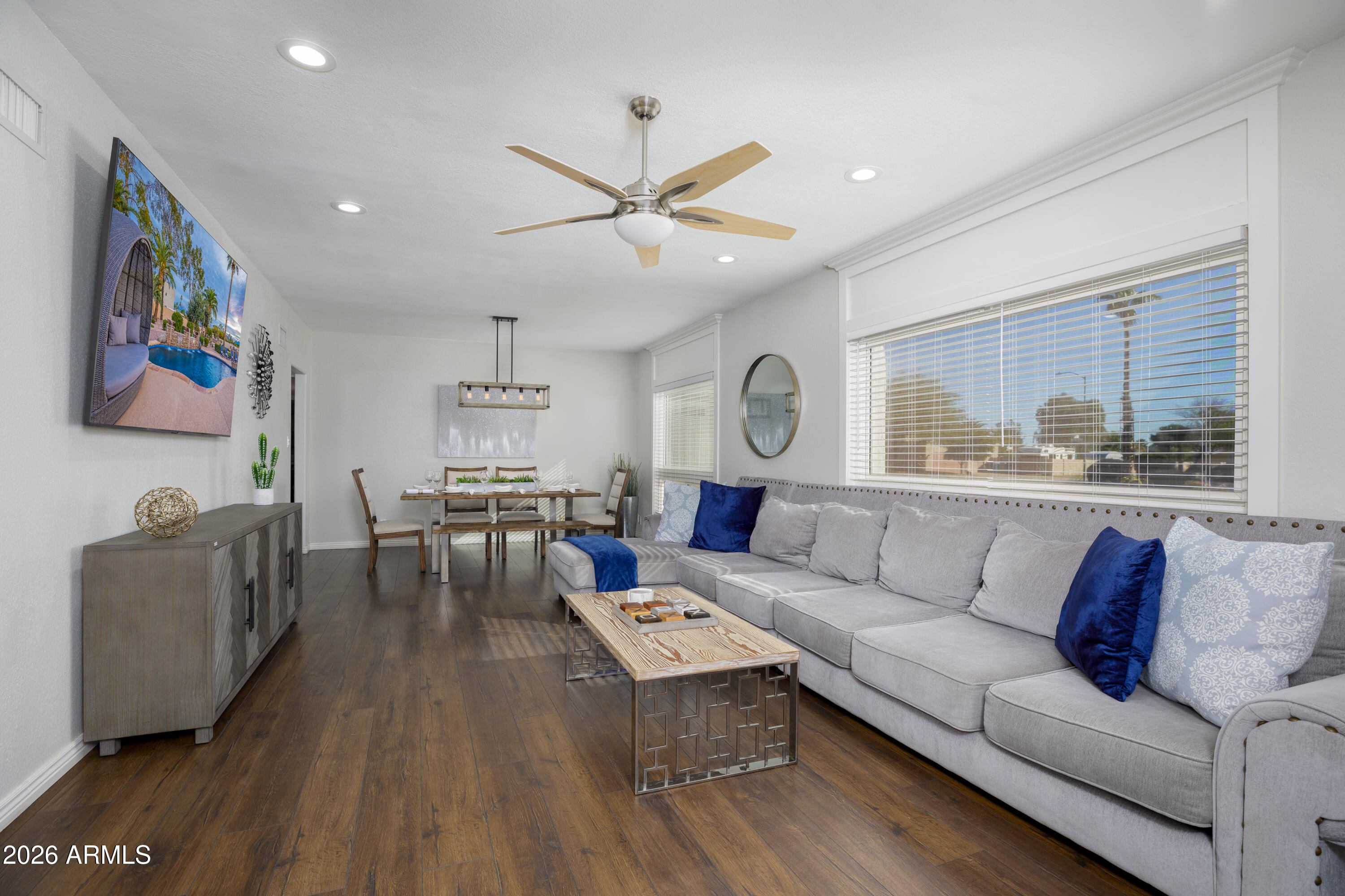 6932 East Presidio Road Scottsdale, AZ 85254 - Photo 12 of 30 a living room with furniture and a large window