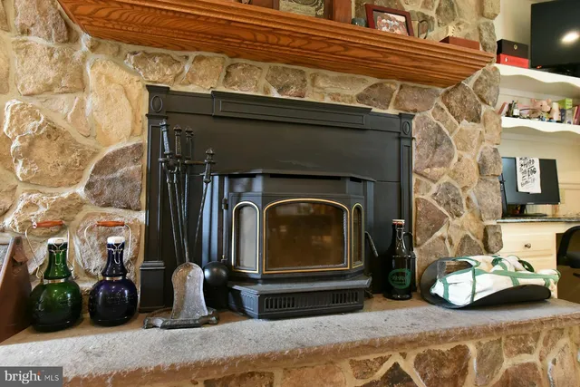 a very nice looking room with a large window and a dining table