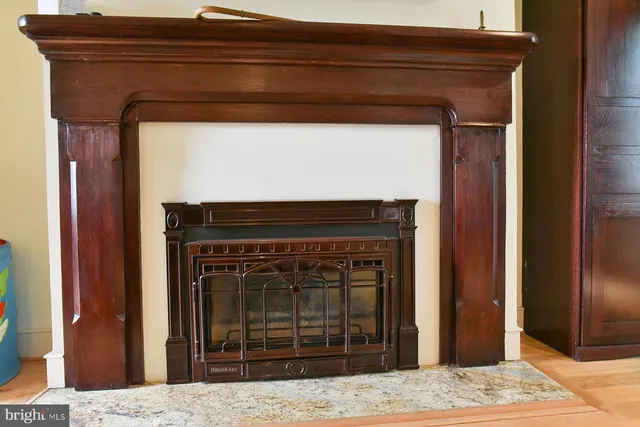 a view of a backyard with a garden and entertaining space